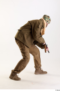 Andrew Elliott Pose with Gun aiming gun crouching standing whole…